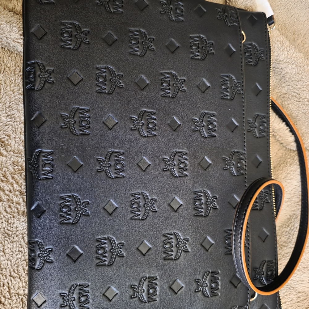 MCM Black Embossed Men's Bag